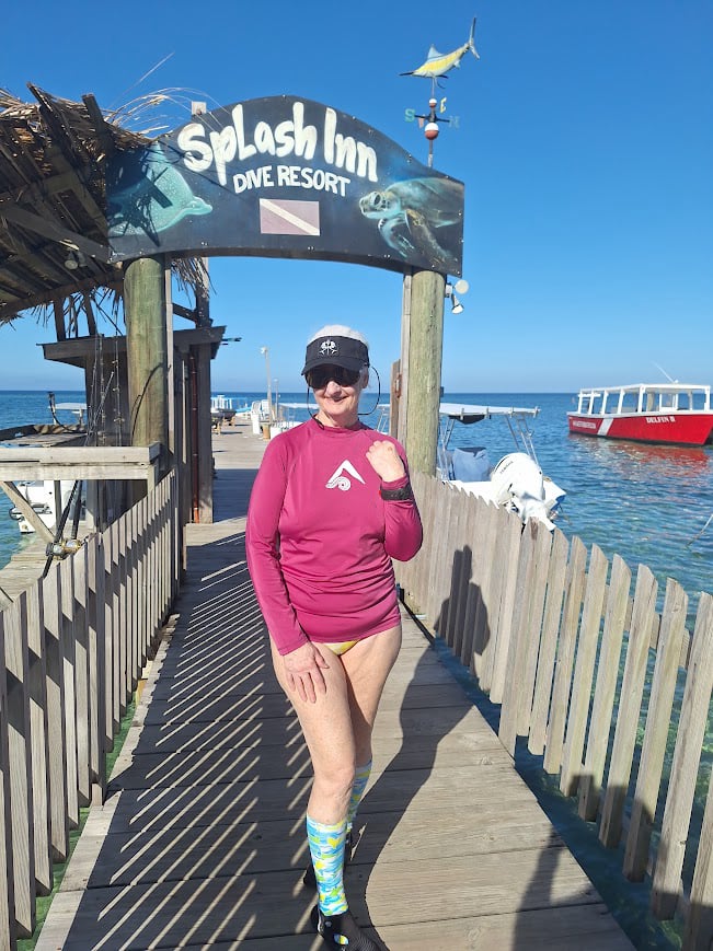 Judy on the dock of Splash Inn in Roatan