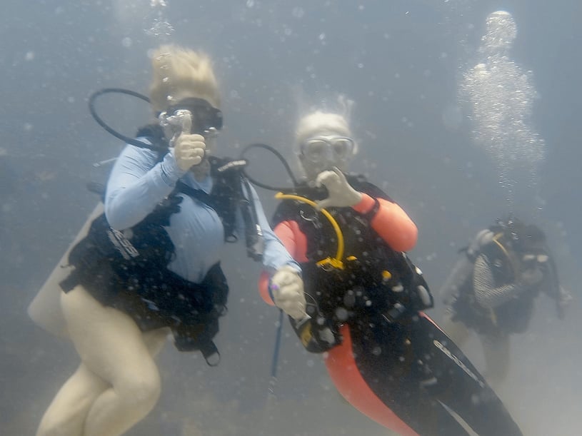 Divers exploring reef at Hedonism